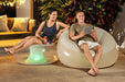 Bestway Inflatable Waterproof LED Chair With 7 Colour Lights - lifestyle image showing product in use