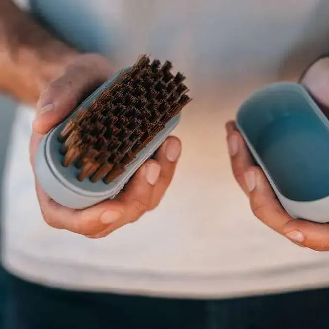 Cadac Soft Soak BBQ Cleaning Brush - product image, showing brush and storage cassette being held