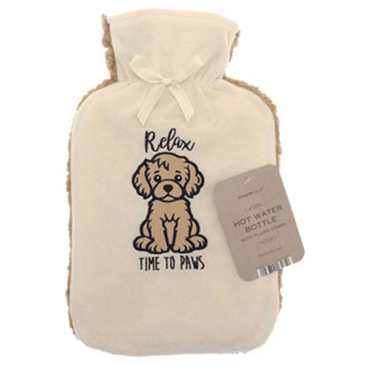 Country Club Relax Time To Paws 2L Sherpa Fleece Hot Water Bottle - main product image, showing a cream-colored hot water bottle with a plush cream cover featuring a brown cartoon dog illustration and the text 'Relax TIME TO PAWS'. A light brown paper tag is attached to the side, and the bottle is photographed on a clean white background.