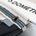 Dometic Rally 200 Poled Caravan Awning - 2026 Model - product image, showing close-up of awning kador strip with eyelet, slid into vehicle rail 