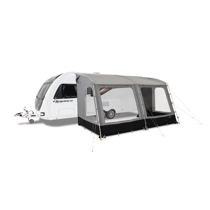 Dometic Rally 390 Poled Caravan Awning - 2026 Model - product image, showing front-side view of awning pitched and attached to caravan rail