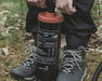 Easy Camp Double Action Manual Air Pump - lifestyle image, showing close-up of person using pump