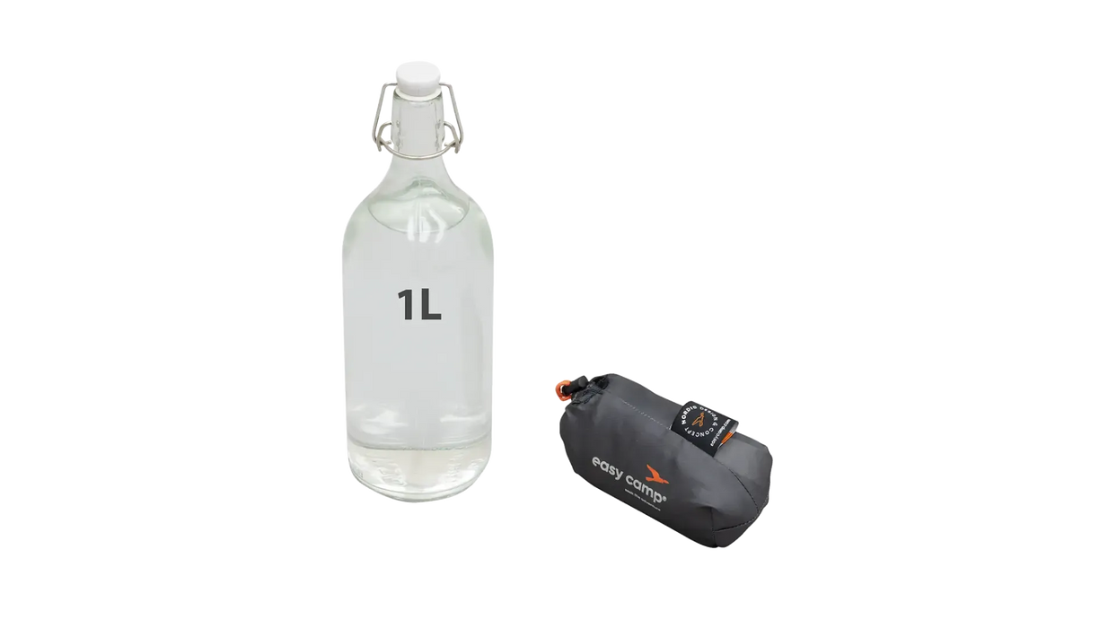 Easy Camp Raven Compact Camping Travel Pillow - product image, showing carry bag size with one-litre decanter for size comparison