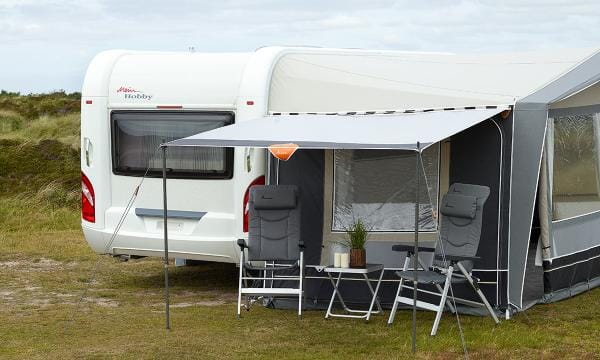 Isabella Shadow 360 Caravan Sun Canopy - product image, shown in use with caravan and awning