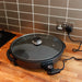 Leisurewize Electric Skillet 38cm - lifestyle image, showing product plugged into home electrical socket