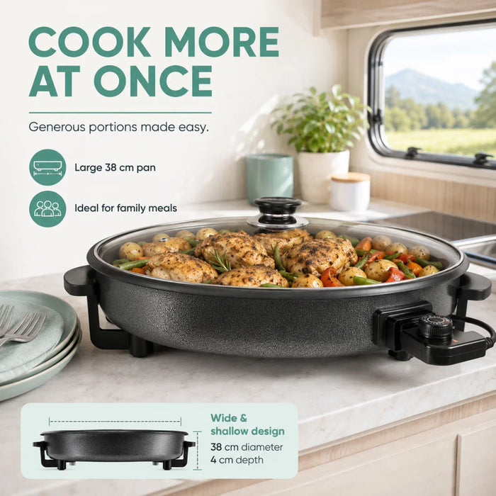 Leisurewize Multi-Functional Electric Skillet / Cooker 1500W - product infographic, showing a skillet containing chicken and vegetables on a worktop inside of a caravan or motorhome, with graphic in lower-left corner showing 38cm diameter and 4cm depth