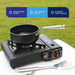 Leisurewize Single Burner Portable Gas Stove 2.5kW - product infographic, showing a portable black gas stove with a small black pan on top, placed on a white table outdoors with grass in the background. A metal spatula rests in front, and a blue feature banner at the top reads 'Long-Lasting Quality', 'Easy & Quick Set-up', and 'Durable & Hard-wearing'.