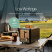 Leisurewize Sleek 2-Slice Toaster Black 850W - product image, showing a compact toaster sits on a folding table inside a tent, with toast in the slots and a jar of jam nearby. Large text reads 'Low Wattage' and 'PERFECT FOR CARAVANS & CAMPING,' with a badge noting '850W POWER'.