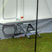Maypole Foldable Steel Double Step - close-up of step shown outside campervan doorway with skirt attached