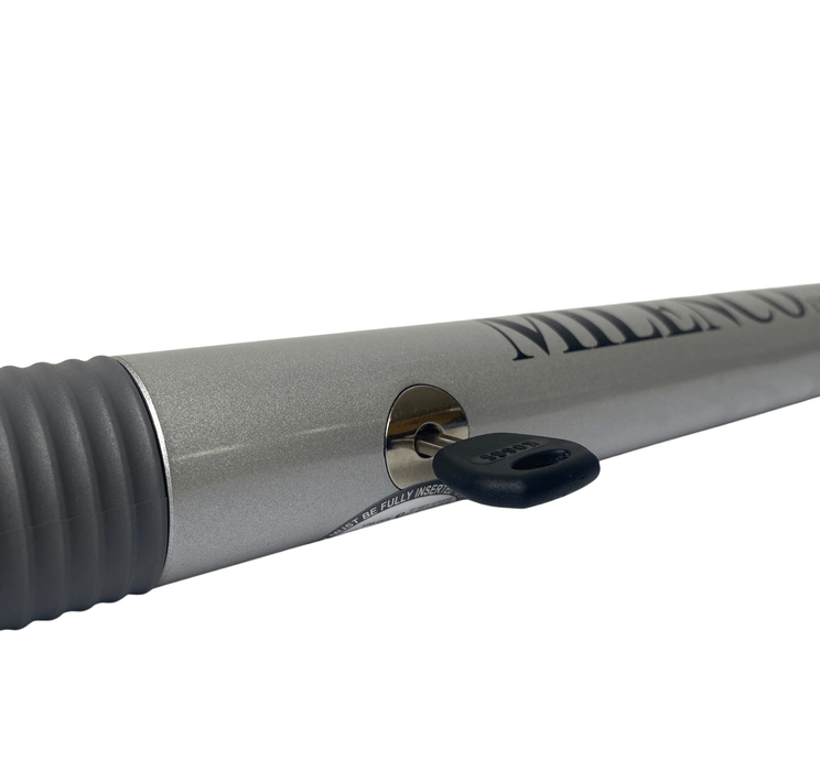 Milenco High Security Steering Wheel Lock - Silver - product image, showing close-up of key in horizontal position inserted into wheel lock