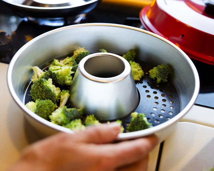 Omnia Perforated Baking Tray lifestyle feature image of tray in action with broccoli ini 