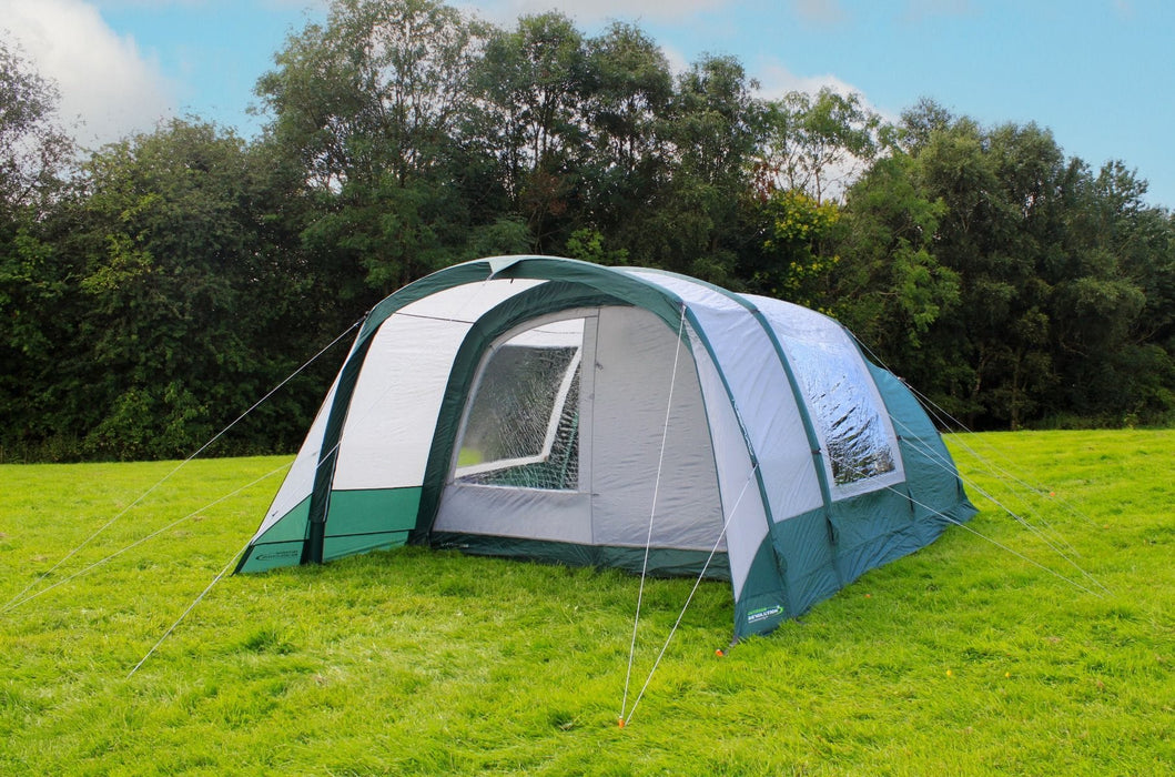 Outdoor Revolution Atom 500 - product image, showing tent pitched in field surrounded by trees, with view into tent entrance
