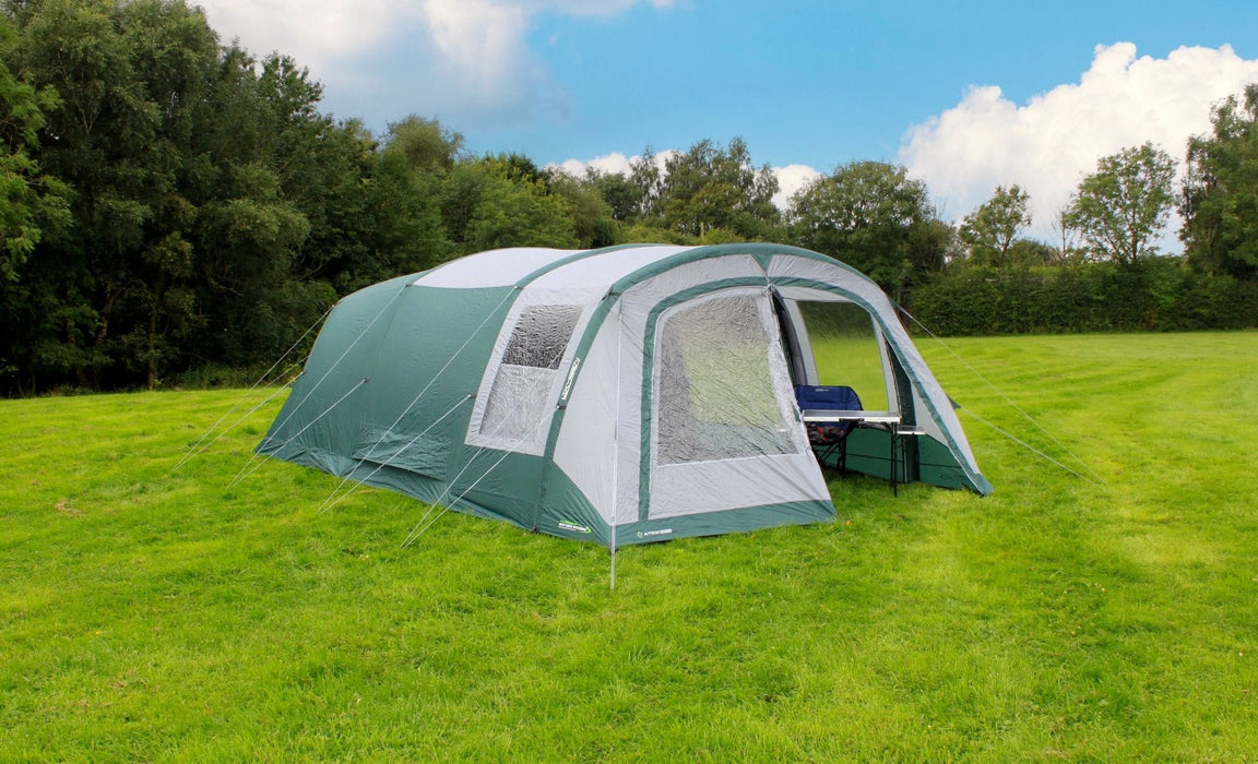Outdoor Revolution Atom 600 - product image, shown pitched in field from front-left view, with outer door open, showing furniture inside