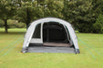 Outdoor Revolution Camp Star 500 DT- Poled 5-Berth Tunnel Tent Bundle feature image of the tent pitched on a green grassy campsite. front view of the then straight in with the doors all unzipped expect the side door.  the large bedroom is on the right side and the middle door is situated on the right side and centre 