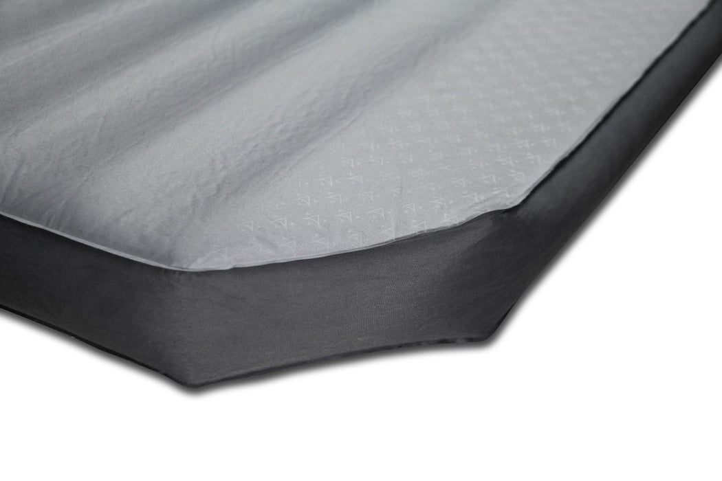 Outdoor Revolution Camp Star Rock 'n' Roll King 100mm Self Inflating Mattress - Monument & dark slate Grey feature image of close up of corner of mat that is cut off to fit in van