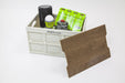 Outdoor Revolution Shimanto Folding Camping Storage Box with Table Top - product image, showing expanded box with table top taken off and leaning against box, with items including gas cartridges inside