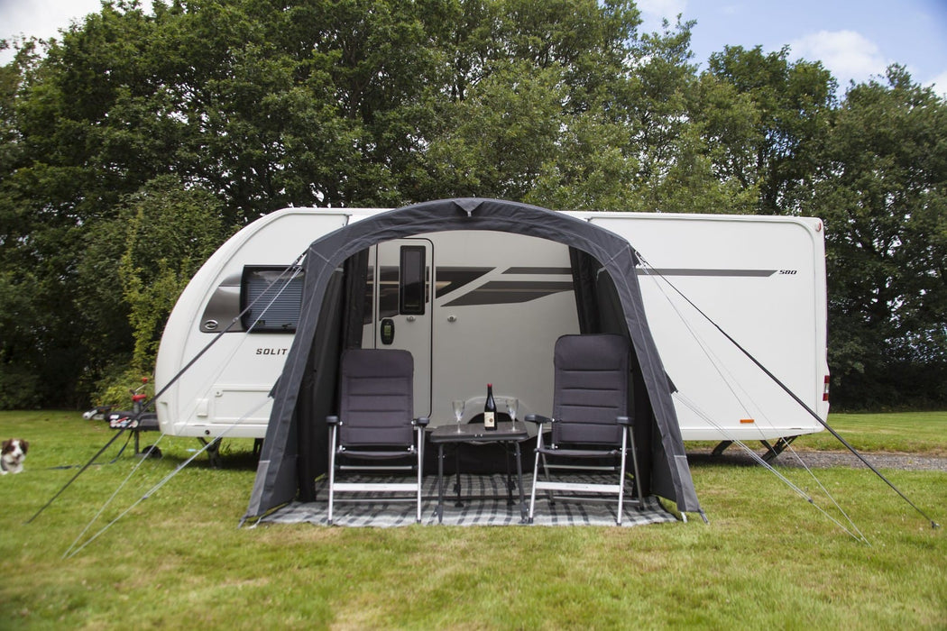 Outdoor Revolution Sport Pro 260 Inflatable Air Canopy with Front Door  front view with chairs and table