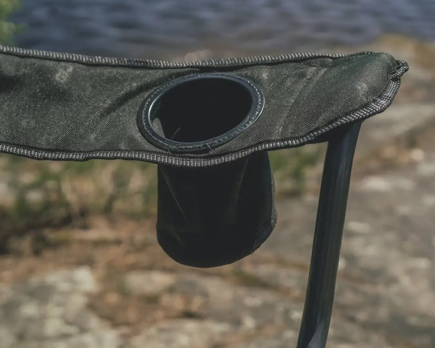 Outwell Catamarca Sofa - 2 Person Camping Chair - lifestyle image, showing close-up of drinks holder outdoors