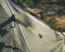 Outwell Cloud 4 - Lightweight 4-Person Dome Tent - lifestyle image, showing close-up of tent pole and guyline attachment