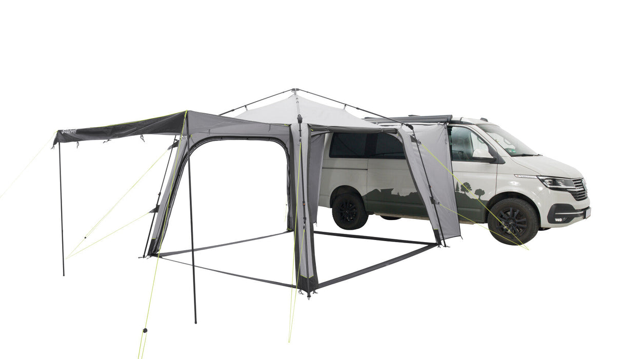 Outwell Fastlane 300 Event Shelter / gazebo / Tent 3m x 3m feature image of shelter with all sides up and one with canopy poles on, connected to van