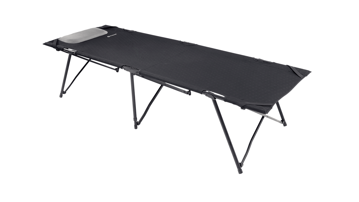 Black folding cot on a white background