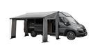 Outwell Sideroads Motorhome Annexe - product image, taken from front-side view, showing annexe attached to awning and vehicle, pitched with guylines, with all entrances open