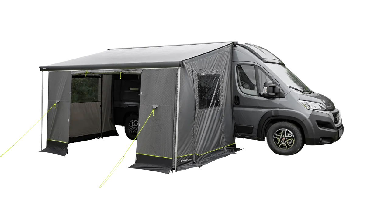 Outwell Sideroads Motorhome Annexe - product image, taken from front-side view, showing annexe attached to awning and vehicle, pitched with guylines, with front entrance only open