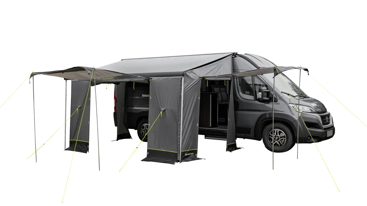 Outwell Sideroads Motorhome Annexe - product image, taken from front-side view, showing annexe attached to awning and vehicle, pitched with guylines, with all entrances open with canopy poles