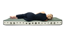 Outwell Sleepnest 10cm Deluxe Self Inflating Camping Mat - product image, showing person lying on mattress, with representation of internal material visible on the side
