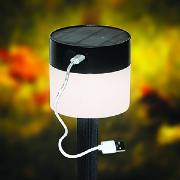PLS Rechargeable Universal Windbreak LED Solar Light - lifestyle image, showing light affixed to windbreak pole, with focus on charging lead hanging from USB recharging port