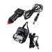 RAC 150 Lumen Rechargeable 3-in-1 Lantern & Torch - product image, showing a black car charger adapter with a cigarette lighter plug, power supply brick, and two cables on a white background.
