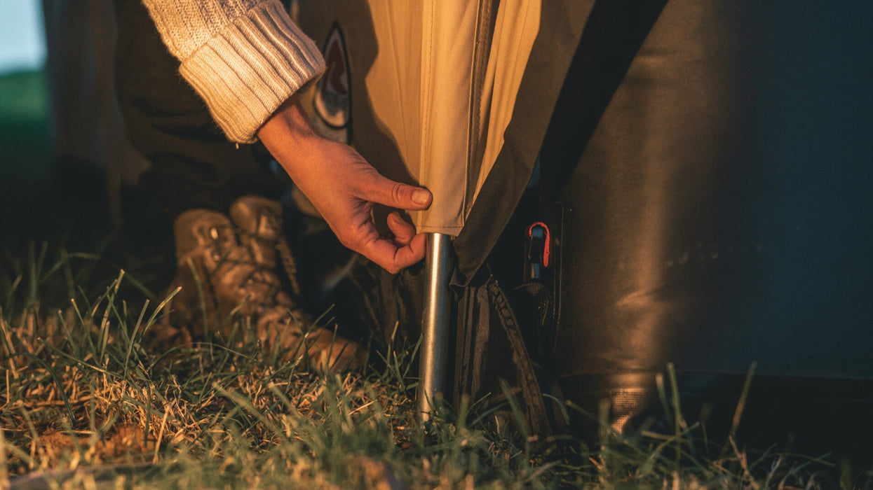 Robens Prospector Castle Tent feature lifestyle image of close up of pole 