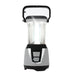 Storm Preparation Kit Bundle 1 – product image, showing a portable LED camping lantern with a silver and black base, a clear body, and a black carrying handle, shown illuminated against a white background.
