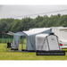 Sunncamp Toldo 390 Caravan Awning - Grey image showing the canopy up with chairs in front and the optional annexe attached. 