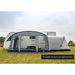 Sunncamp Toldo 390 Caravan Awning - Grey feature image viewed from front with awning pitched against caravan . doors zipped up but curtains rolled up. Annexe on the right side