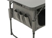 Travellife Toledo Wide Folding Camping Storage Unit – product image, showing closeup of a grey folding table with a side storage pocket and organizer pouches, shown on a white background.