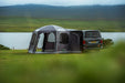 Vango Airhub Hexaway Pro Drive Away Awning Low - Cloud Grey lifestyle image of awning pitched by lake with 2 doors open