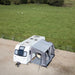 Vango Balletto Air 390 Inflatable Caravan Porch Awning - 2026 Model - lifestyle image, showing couple inside awning attached to caravan from bird's eye view