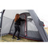 Vango Cove II Air Inflatable Drive Away Awning Smoke - Low lifestyle image of front door being zipped up