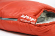 Vango Nitestar Alpha 450 Sleeping Bag - Harrissa Red feature image of close up of logo and name at the top of zip