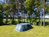 Vango Savannah 600XL 6-Person Family Tent Package - lifestyle image, showing tent pitched in field with surrounding trees