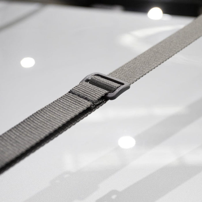 Vango Tailgate AirHub II Low Drive Away Awning - product image, showing close-up of fastening straps with buckle