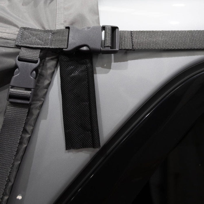 Vango Tailgate AirHub II Low Drive Away Awning - product image, showing close-up of fastening straps