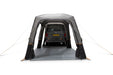 Vango Tailgate AirHub II Low Drive Away Awning - product image, shown attached to vehicle with all doors closed from rear end view