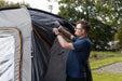 Vango Tailgate Airhub Low Rear Drive Away Awning show rolling up connection tunnel