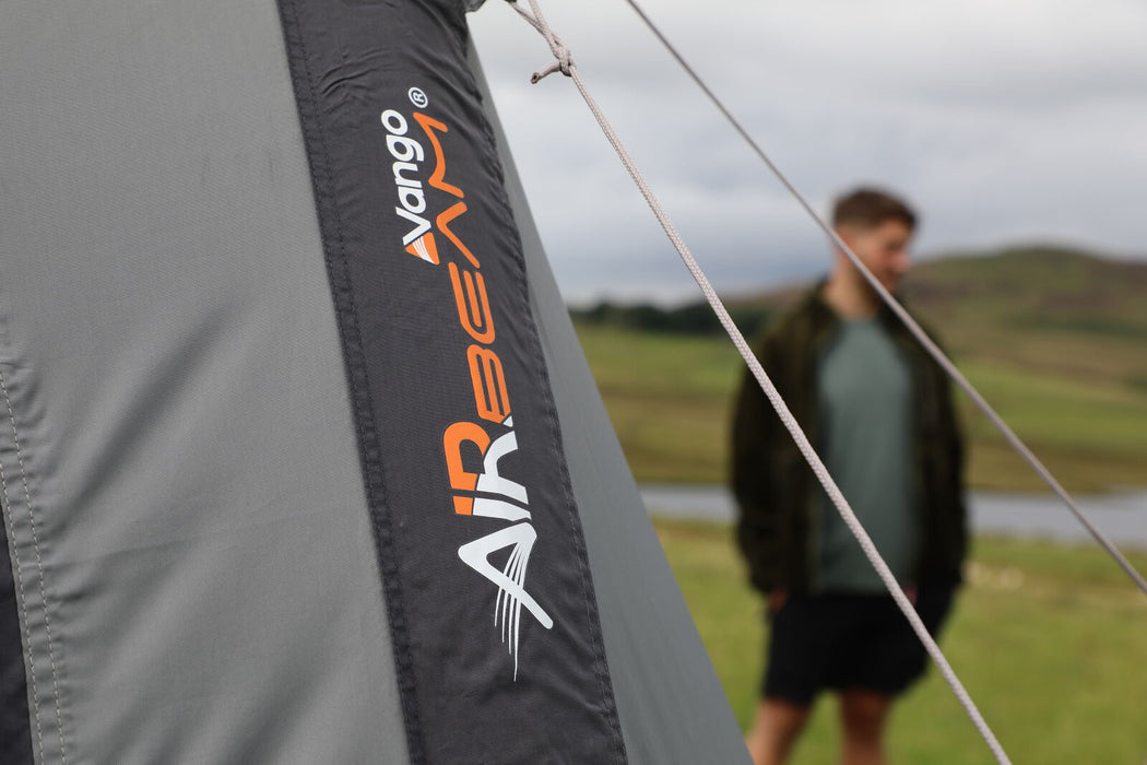 Vango Versos Air Inflatable Cloud Grey Drive Away Awning - Low feature close up image of airbeam and guylines. 
