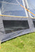 Vango Versos Air Inflatable Cloud Grey Drive Away Awning - Low feature image of the vents open below the clear window panels
