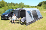 Outdoor Revolution Cacos Air SL Low Driveaway Awning lifestyle image of front of awning with door open to interior with table and chair in canopy 
