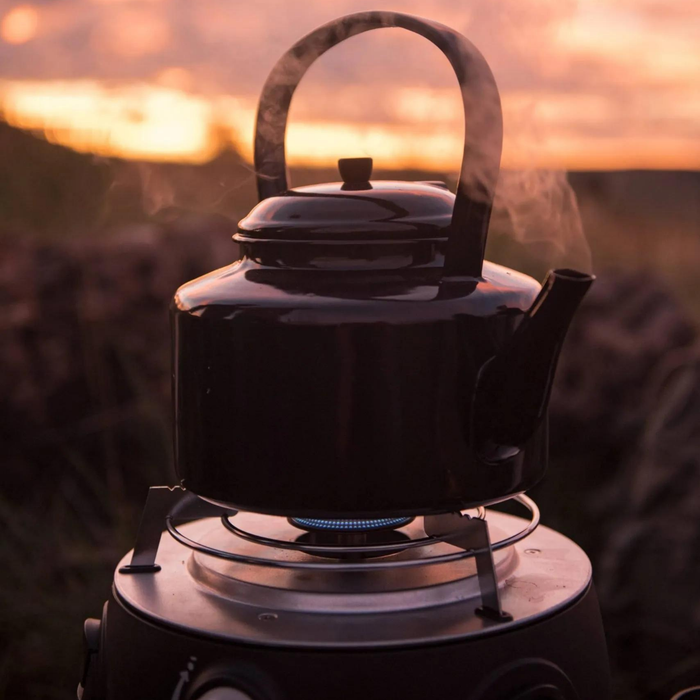 Cadac Safari Chef 30 HP Portable gas BBQ kettle at sunset lifestyle image