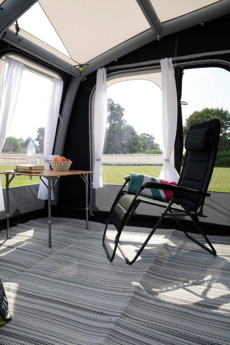 Kampa AIR Pro 260 Inflatable Caravan Porch Awning 2020 - Internal photo showing example chair, table and carpet.